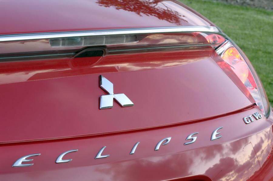  Mitsubishi Eclipse 2009 года  (фото 46 из 205)